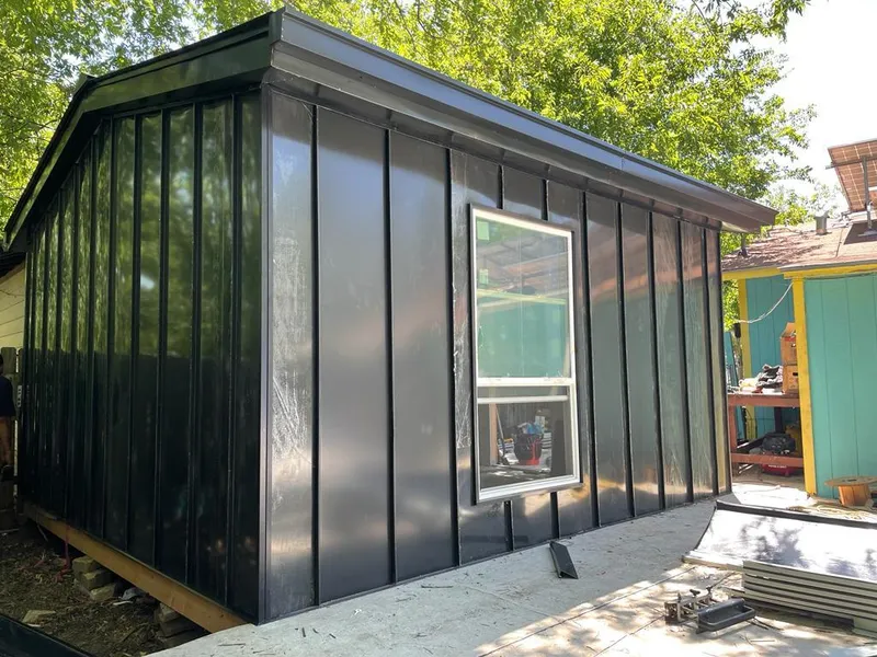 Black standing seam metal wall panels for Roof Inspection in Simi Valley